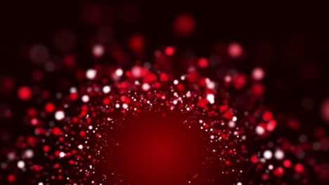 red glowing shiny round particles fly around the vortex. abstract fire animation on a dark looped background.