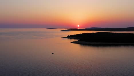 beautiful sunset flare over the horizon in losinj island in northern adriatic sea - wide shot