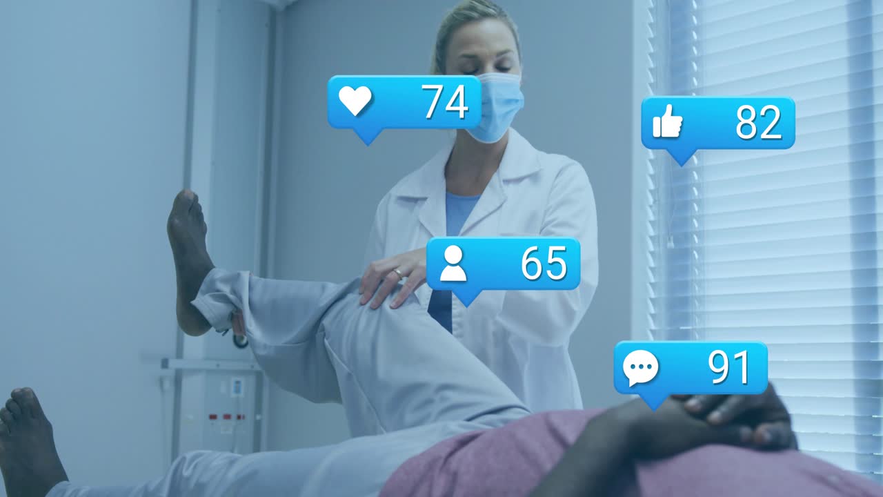 Clinician lifting patient's leg during health check, showing chat bubble and icon counts rising