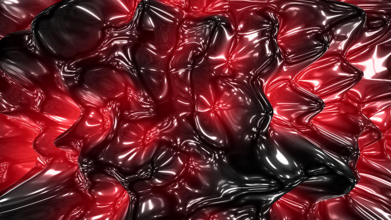 Close-up abstract footage of glossy red and black liquid-like surface with ripples and reflections, creating a futuristic background texture for technology and design