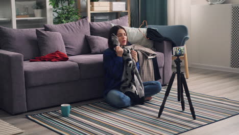 woman reviewing clothing online
