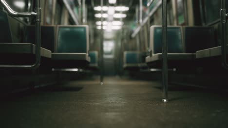 inside of the old non-modernized subway car in usa