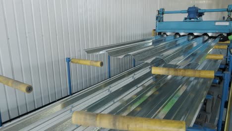 metal sheet forming machine at the modern metalwork factory.