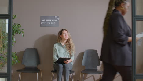 female candidate waiting for job interview
