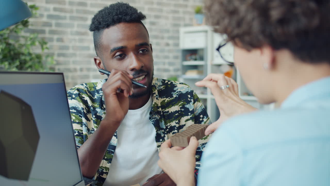 Design Team Discussing Prototype