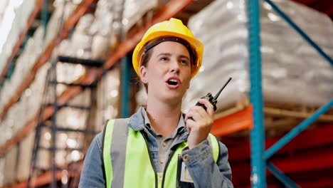 warehouse worker using a walkie talkie