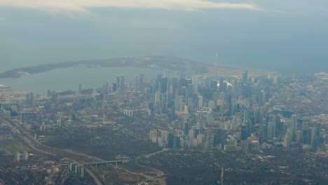 fog lake ontratio toronto downtown buildings cn tower aerial from airplane
