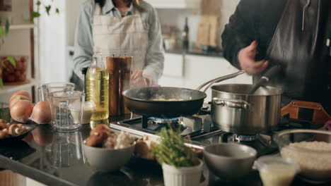 couple cooking together at home