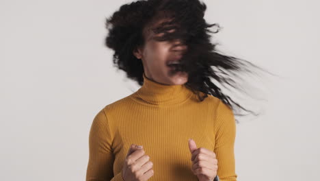 African-american-emotional-woman-over-white-background.