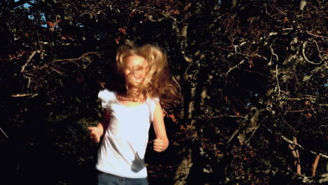 Little-girl-jumping-on-a-trampoline