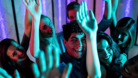 Composition-of-group-of-caucasian-female-and-male-people-dancing-at-disco