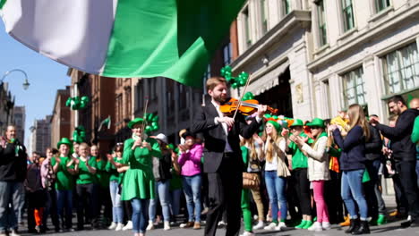 vibrant st. patrick's day parade featuring a live violin performance