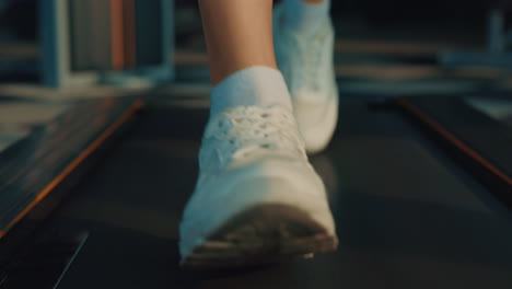 person walking on treadmill
