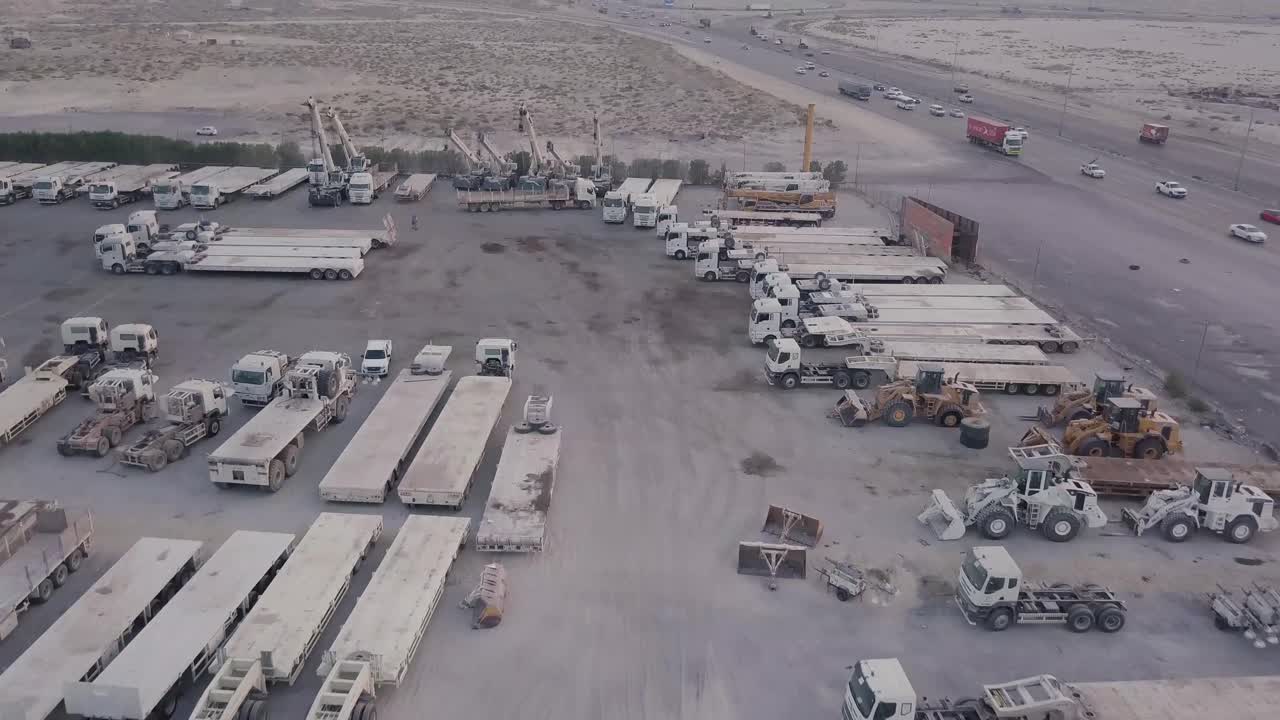 Industrial Vehicle Yard Aerial Footage – Fly Forward