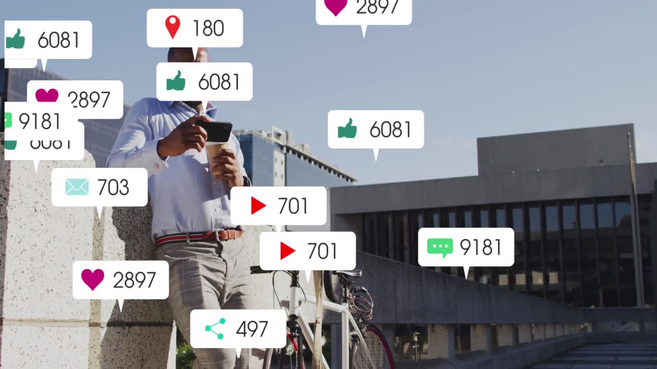animación de iconos de las redes sociales sobre un hombre afroamericano usando un teléfono inteligente en el parque corporativo