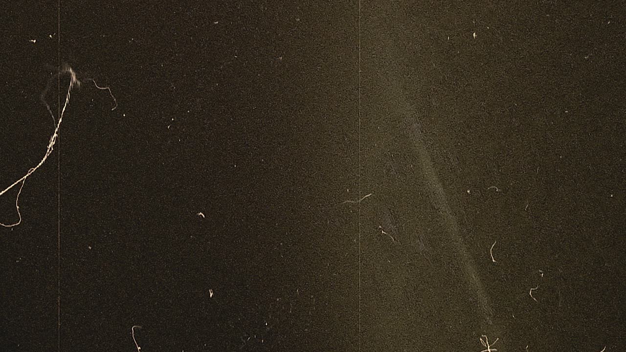 fondo de cine de 8 mm. los arañazos y sacudidas se levantan de una película de 8 mm real. esto se hace en el metraje