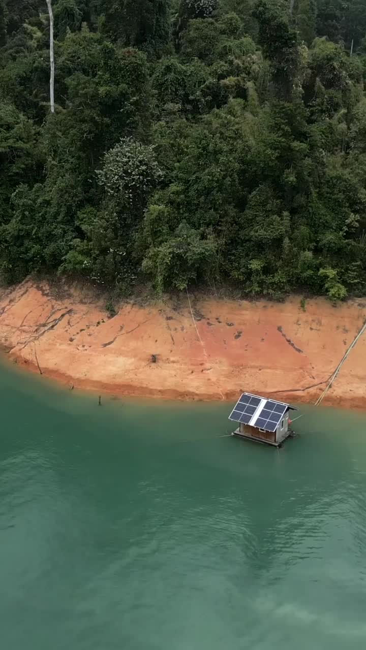 Floating Houseboat on a Lake with Solar Panels