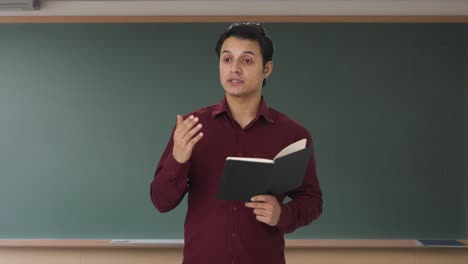 indian teacher teaching in class