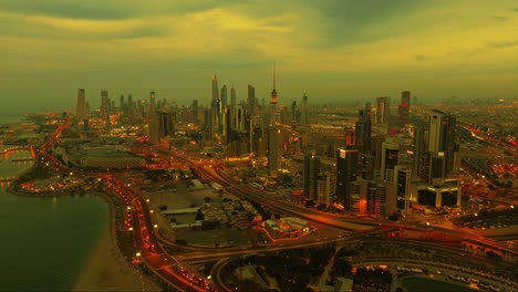 4k drone view of kuwait city during golden hour. illuminated skyline, glowing roads, and dramatic clouds. perfect for documentaries, travel content, or city b-roll.