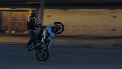 a rider performs amazing stunts on a motorcycle in slow motion 3