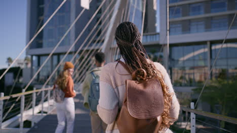 people on a modern bridge