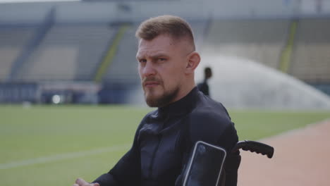 disabled athlete in wheelchair at stadium