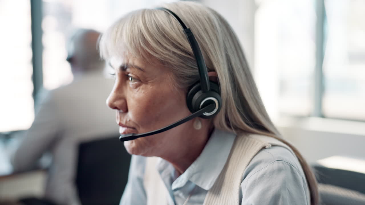 Businesswoman with headset in office