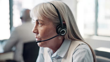 businesswoman with headset in office