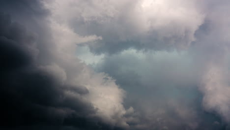 rich textures and colours of clouds moving across the sky above