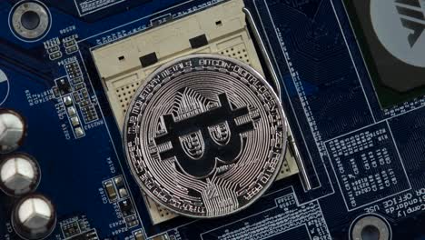 Bitcoin Coin on Circuit Board