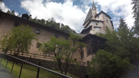 sanctuary of san romedio on a steep rocky spur in natural scenery