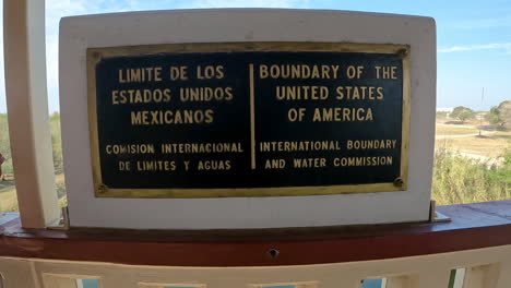 sign at the border of the united states and mexico on the progeso international bridge over the rio grande river