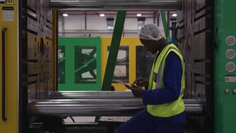 warehouse worker using a digital tablet