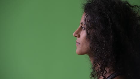 profile view of young happy beautiful hispanic woman ready for gym