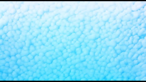 animación de formas blancas que se mueven sobre un fondo azul
