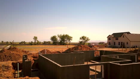 a drone shot push in on a foundation and basement walls that had just been poured