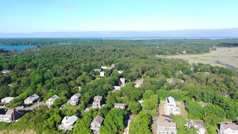 Cape-Cod-Bay-Aerial-Drone-Footage-of-Beach-Houses,-Marsh-and-Forest-Panning-Right