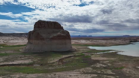 Large-Distinctive-Rock-Formation-Lone-Rock-During-Drought-In-Man-made-Lake-Powell-On-The-Border-Of-Arizona-And-Utah