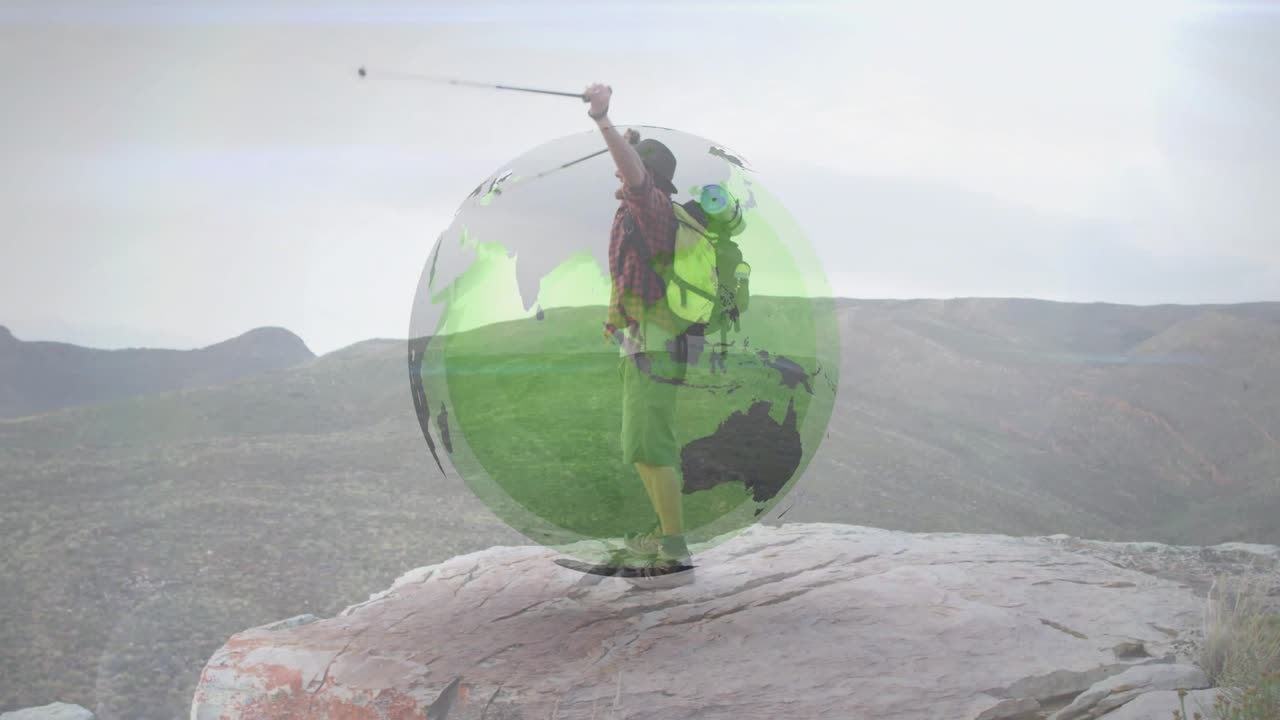 Caminhante homem andando na borda, com uma sobreposição de globo crescendo ao seu redor, fincando o bastão, celebrando os mapas.