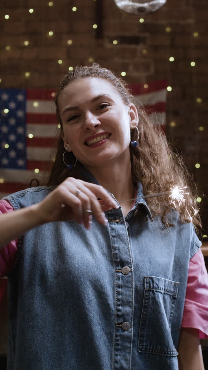 Woman celebrating with sparkler