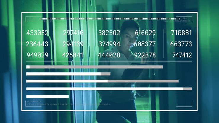 Datacentertekniker trykker reolskabslågen og scroller på tablet, mens han overvåger skiftende søjlediagrammer.