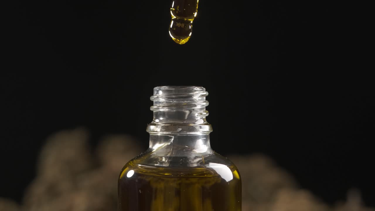 Koncept for medicinsk CBD-oliebehandling og -produktion. Meget tæt makrovisning.