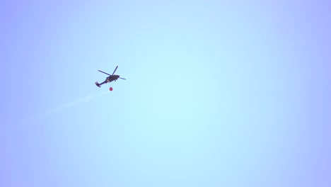 helicopter water drop on fire