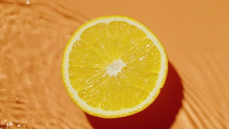 orange slice on water splash