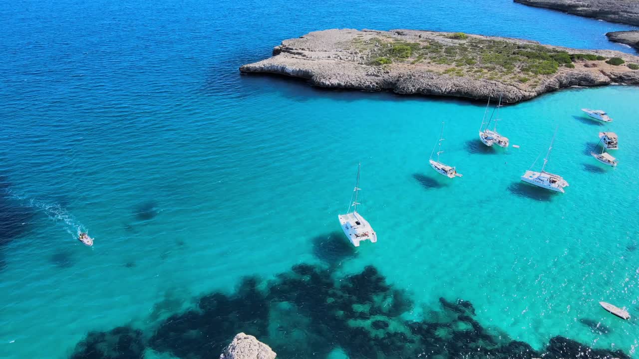 Explore the breathtaking Cala Varques in Mallorca, where turquoise waters meet rugged cliffs and peaceful sailing. Experience tranquility and natural beauty in this idyllic coastal paradise.