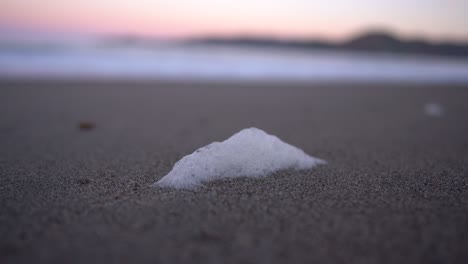 Sea-Foam-on-Sandy-Beach