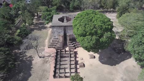 aerial,birdseye view towards wat si chum buddha statue at sukhothai,footage stops on the top of the buddha statue at its top.
