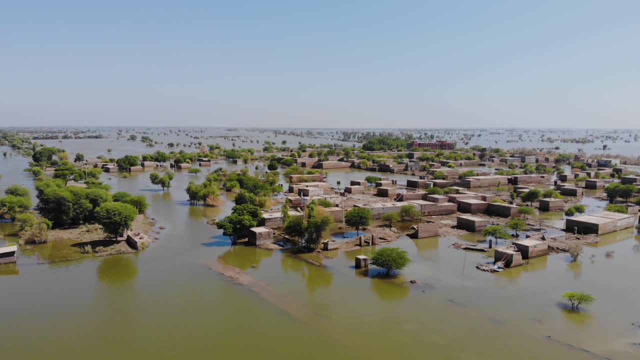 Aerial Panoramic View Of Rural Buildings Submerged In Flood Water In Mehar, Sindh, Pakistan
