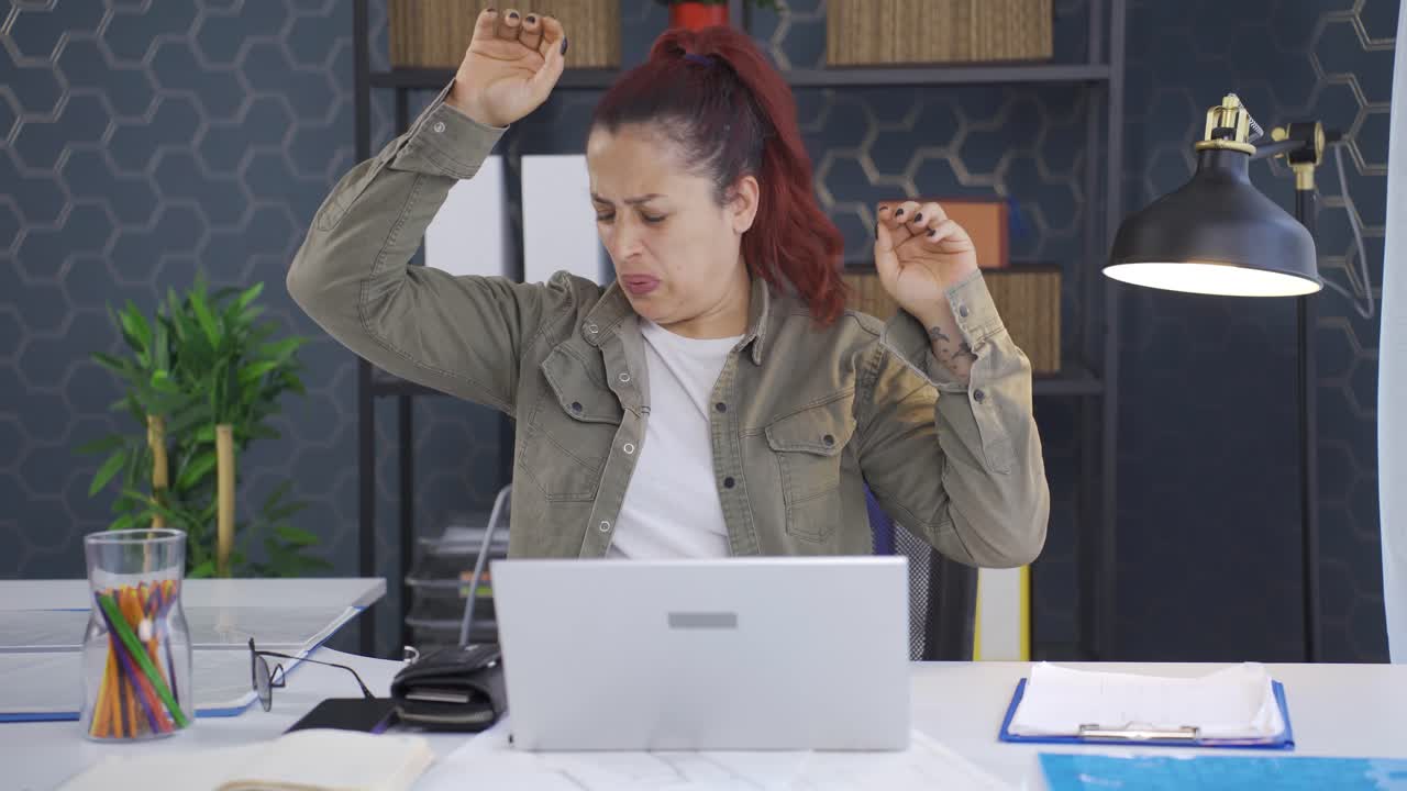 Sweating business woman unhappy and sad.