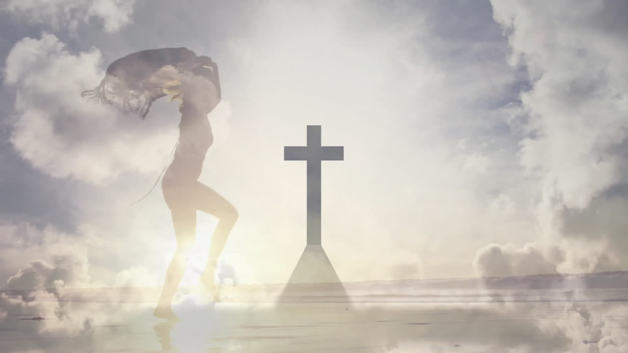 woman running against sunrise in health campaign, holding flowing scarf over dark cross silhouette